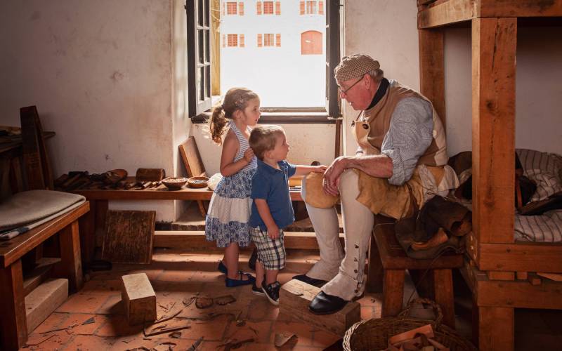 Re-enactors firing muskets